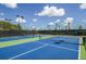 Two well-maintained tennis courts with blue and green surfaces at 3134 Francoa Dr, Odessa, FL 33556