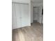 Bedroom with double door closet and wood floors at 316 11Th N Ave, St Petersburg, FL 33701