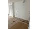 Unfinished interior room with new flooring and white walls at 316 11Th N Ave, St Petersburg, FL 33701