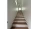 Modern staircase with light wood treads and white risers at 316 11Th N Ave, St Petersburg, FL 33701