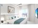 Bright bedroom with water views and comfortable bed at 411 E Shore Drive # 311, Clearwater Beach, FL 33767