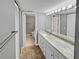 Updated bathroom with granite countertops and modern vanity at 5700 Escondida S Blvd # 306, St Petersburg, FL 33715