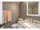 Clean bathroom with granite countertop, single vanity, and a walk-in shower at 5700 Escondida S Blvd # 306, St Petersburg, FL 33715