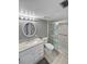 Updated bathroom with granite vanity and a walk-in shower at 5700 Escondida S Blvd # 306, St Petersburg, FL 33715