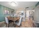 Dining area with view into kitchen at 5700 Escondida S Blvd # 306, St Petersburg, FL 33715