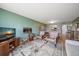 Open living room with fireplace and view at 5700 Escondida S Blvd # 306, St Petersburg, FL 33715