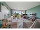 Bright living room with golf course view at 5700 Escondida S Blvd # 306, St Petersburg, FL 33715