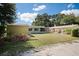 Backyard view showing shed and neighboring homes at 5575 6Th N Ave, St Petersburg, FL 33710