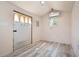 Small workshop or studio space with light flooring and AC unit at 5575 6Th N Ave, St Petersburg, FL 33710