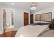 Bedroom view with doors leading to a closet and ensuite bathroom featuring elegant modern design at 5518 21St S Ave, Gulfport, FL 33707