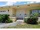 Front entrance with double doors and brick walkway at 3934 Venetian Way, Tampa, FL 33634