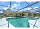 Relaxing pool area with screened enclosure at 3934 Venetian Way, Tampa, FL 33634