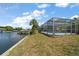 Pool and canal view from backyard at 3934 Venetian Way, Tampa, FL 33634