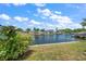 Lovely view of the canal and other homes at 3934 Venetian Way, Tampa, FL 33634