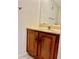 Clean bathroom with wood vanity and tiled floor at 7050 Sunset S Dr # 203, South Pasadena, FL 33707