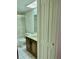 Bathroom with shower/tub combo and wood vanity at 7050 Sunset S Dr # 203, South Pasadena, FL 33707