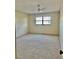 Spacious bedroom with carpeted floors and ceiling fan at 7050 Sunset S Dr # 203, South Pasadena, FL 33707