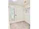 Walk-in closet with mirror and ample storage at 7050 Sunset S Dr # 203, South Pasadena, FL 33707