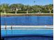 Relaxing pool view overlooking a lake and golf course at 6460 Fairway View S Blvd, St Petersburg, FL 33707