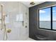 Shower with built-in seat and multiple shower heads at 191 Punta Vista Dr, St Pete Beach, FL 33706