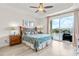 Main bedroom with water view and private balcony at 600 Bayway Blvd # 504, Clearwater Beach, FL 33767