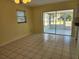 Dining room with view of sunroom at 119 Stafford Dr, Palm Harbor, FL 34684