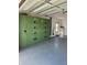 Attached garage with ample storage cabinets at 119 Stafford Dr, Palm Harbor, FL 34684