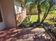 Brick side exterior showcasing a well-maintained landscape at 119 Stafford Dr, Palm Harbor, FL 34684