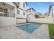 Clean lines and a refreshing pool in this home's backyard at 125 48Th N Ave, St Petersburg, FL 33703