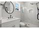 Modern bathroom with white marble shower and vanity at 125 48Th N Ave, St Petersburg, FL 33703