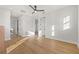 Light and airy hallway with hardwood floors and access to bedrooms at 125 48Th N Ave, St Petersburg, FL 33703