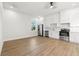 Bright kitchen with white cabinets and wood floors at 125 48Th N Ave, St Petersburg, FL 33703