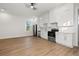 Modern kitchen with white cabinets and stainless steel appliances at 125 48Th N Ave, St Petersburg, FL 33703