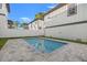 Private backyard pool with patio and lounge chairs at 125 48Th N Ave, St Petersburg, FL 33703