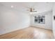 Bright bedroom with hardwood floors and large window at 2511 N Grady Ave # 53, Tampa, FL 33607