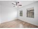 Bright bedroom with light wood floors and ceiling fan at 2511 N Grady Ave # 53, Tampa, FL 33607