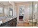 Bathroom with granite vanity and view of bedroom at 18 Franklin S Ct # A, St Petersburg, FL 33711