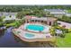 Resort-style community pool and spa with lush landscaping at 18 Franklin S Ct # A, St Petersburg, FL 33711