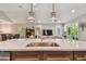 Modern kitchen island with quartz countertop and double sink at 18 Franklin S Ct # A, St Petersburg, FL 33711