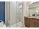 Spa-like Primary bathroom with a large walk-in shower and modern fixtures at 18 Franklin S Ct # A, St Petersburg, FL 33711