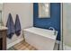 Relaxing Primary bathroom with free-standing tub and walk-in shower at 18 Franklin S Ct # A, St Petersburg, FL 33711