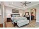 Spacious Primary bedroom with king bed, light walls, and ample natural light at 18 Franklin S Ct # A, St Petersburg, FL 33711