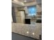 Bright kitchen features granite countertops and modern appliances at 1211 N Mcmullen Booth Rd # 1211, Clearwater, FL 33759