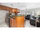 View of kitchen with breakfast bar that opens to living space, creating an inviting atmosphere with lots of natural light at 108 14Th Ave # 3, St Pete Beach, FL 33706