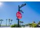 Street view featuring signage for 14th Avenue and Gulf Way, with palm trees and a beach access point visible at 108 14Th Ave # 3, St Pete Beach, FL 33706