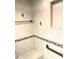 Walk-in shower with built-in seat at 1964 Arvis E Cir, Clearwater, FL 33764