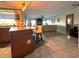 Open concept kitchen with breakfast bar, looking into the living room at 1964 Arvis E Cir, Clearwater, FL 33764