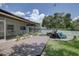 Deck and patio area overlooking a spacious backyard at 2098 Swan Ln, Safety Harbor, FL 34695