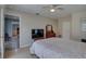 Spacious bedroom with ceiling fan and hardwood floors at 2098 Swan Ln, Safety Harbor, FL 34695