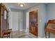 Bright entryway with hardwood floors, and access to other rooms at 2098 Swan Ln, Safety Harbor, FL 34695